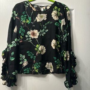 Used H&M brand blouse with flower print.